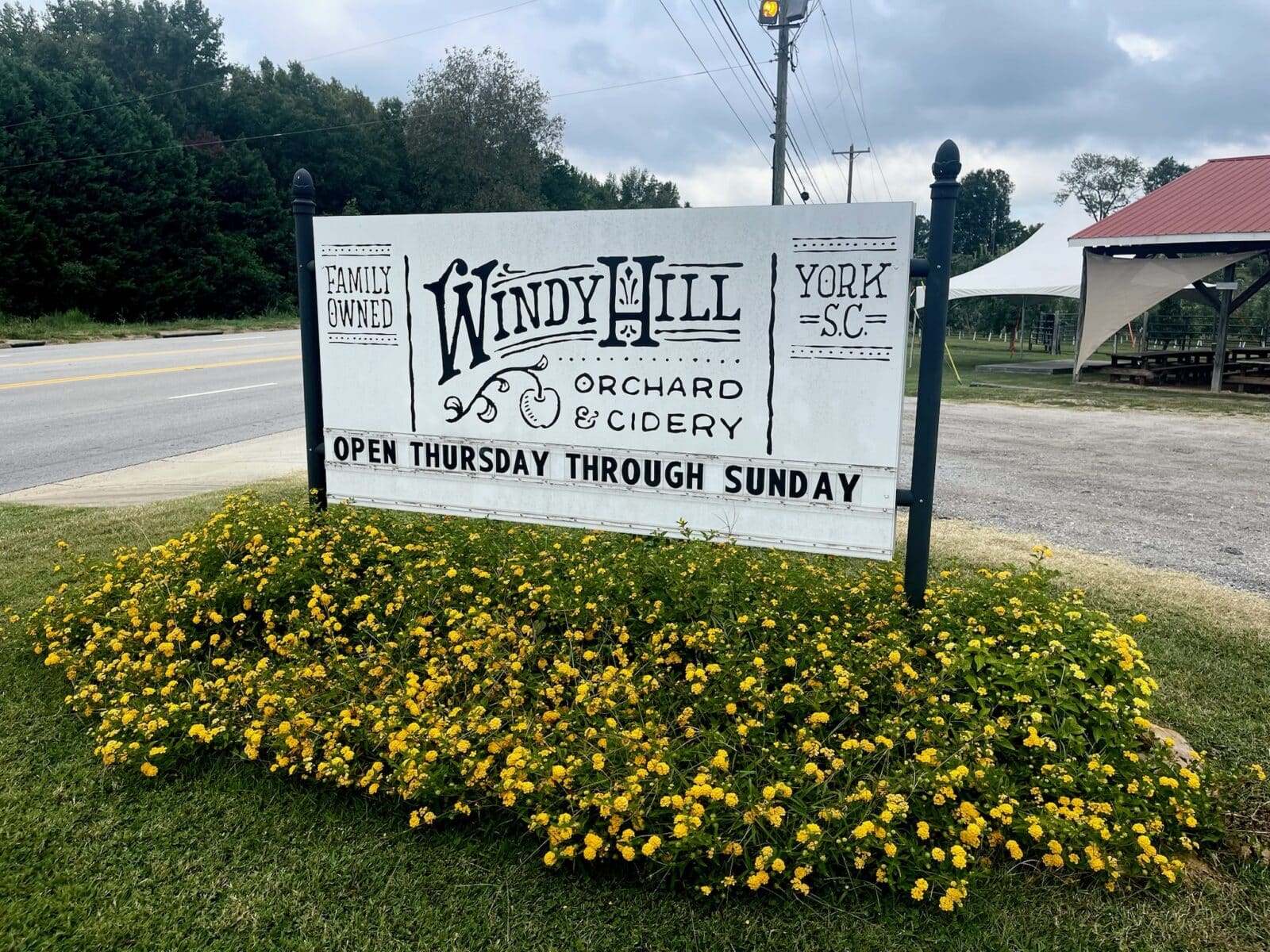 front sign at an apple orchard event